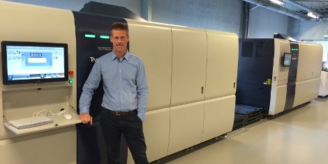 Peter Debaere, owner of Silhouet Digital Print with his new Truepress Jet520HD inkjet press