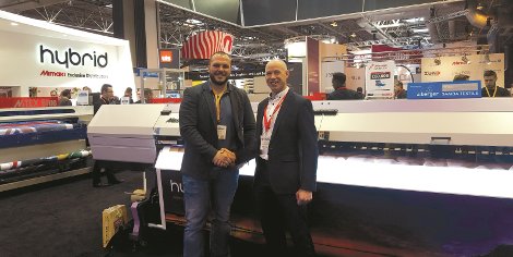 Andrew O'Brien of W.C. O'Brien and Bernard Hoey of Reprocentre with the Mimaki UJV55-320.